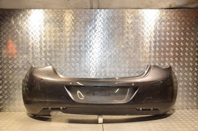 Бампер задний 13266587 OPEL