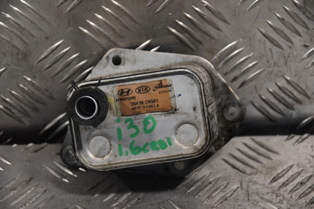 Радиатор масляный (холодильник) под фильтром 264102A501 HYUNDAI
