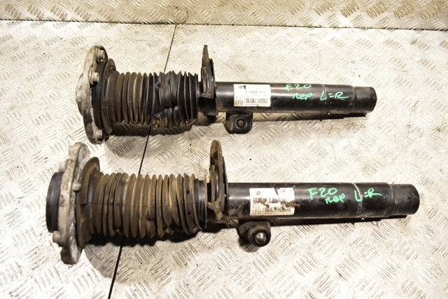 Стойка амортизатора передняя 31316873721 BMW