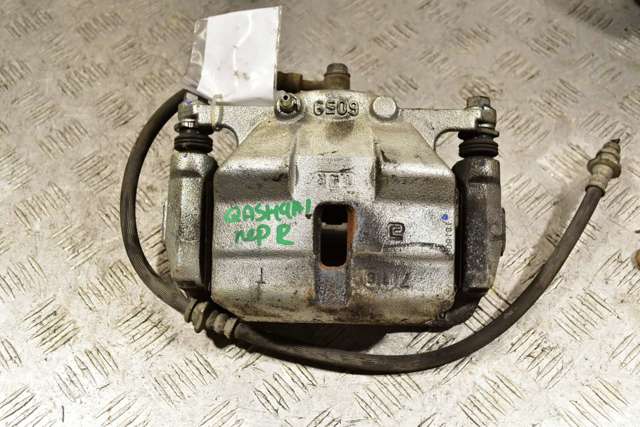 Суппорт тормозной, передний, правый 41001JD00A NISSAN