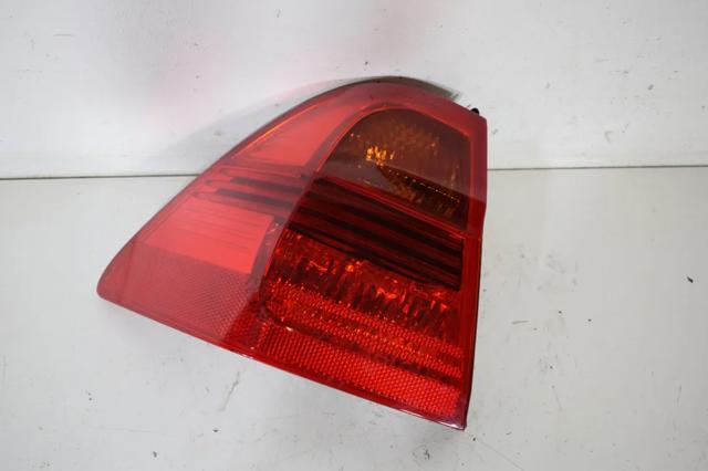 Задний левый внешний фонарь 7160061 BMW
