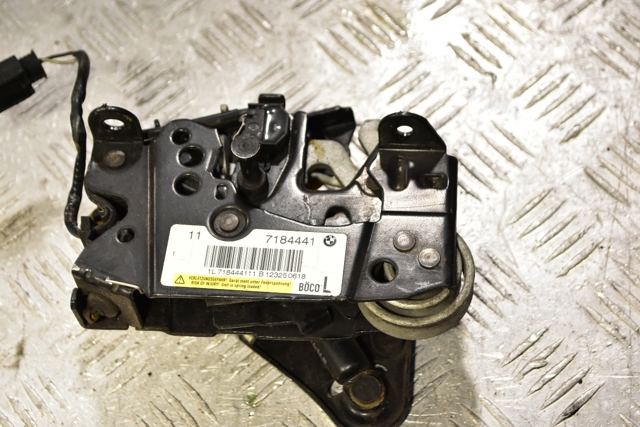 7184441 BMW Замок капота левый купить в Ирпень