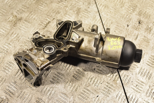  Корпус масляного фильтра 7788453 BMW