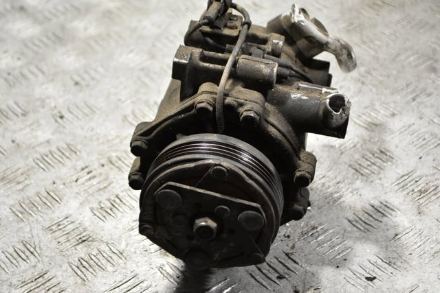 Компрессор климатической установки 9520062JA0 SUZUKI