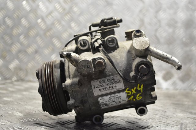 9520062JA0 Suzuki Компрессор кондиционера