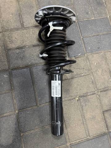 Амортизатор передней подвески левой 31316852413 BMW