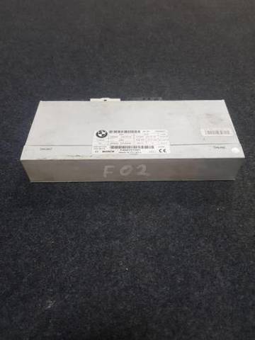 ЭБУ открытия крышки багажника/двери 3-й (5-й) 61357327886 BMW
