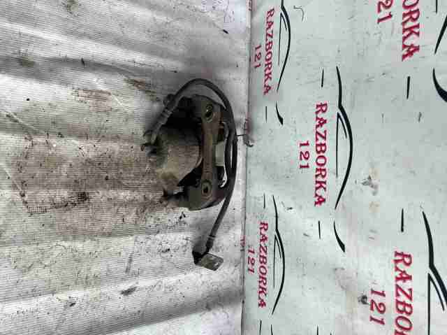 Суппорт тормозной передний левый 58180C1A00 HYUNDAI