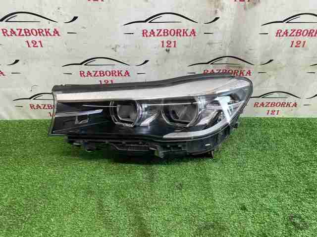 Блок фара левая 63117408711 BMW