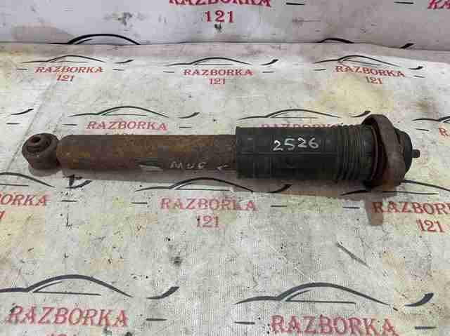Амортизационная стойка задняя E62105AA0C NISSAN