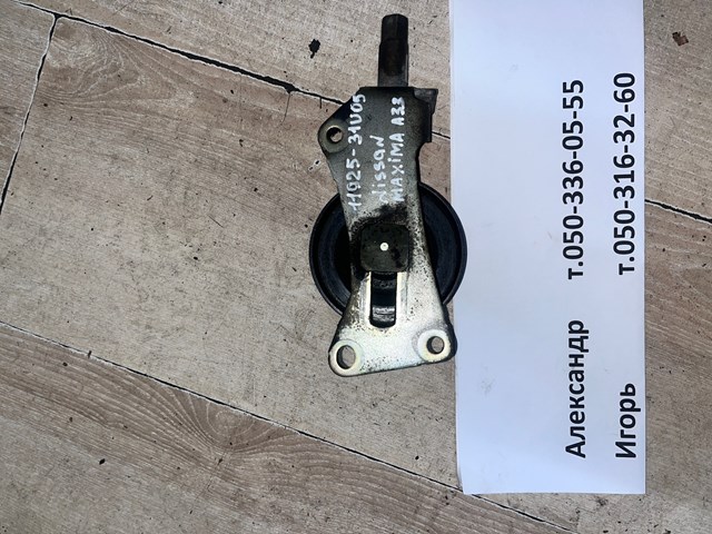 Ролик натяжителя ремня агрегатов 1192531U05 NISSAN