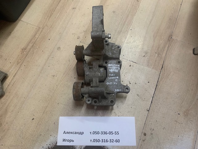 Кронштейн генератора натяжной 1801A100 MITSUBISHI