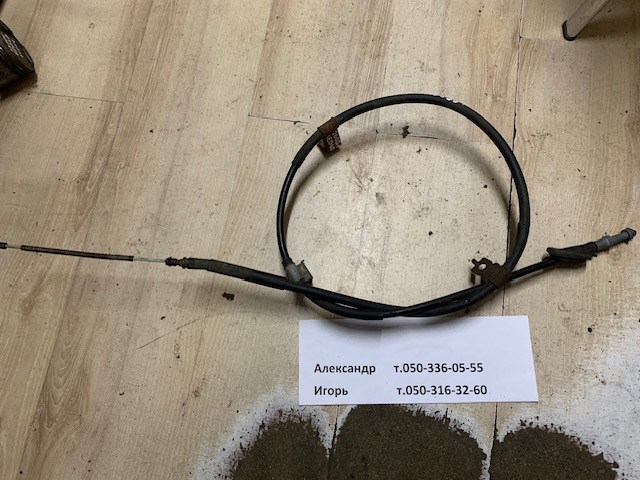 Трос ручника задний 26051AE010 SUBARU