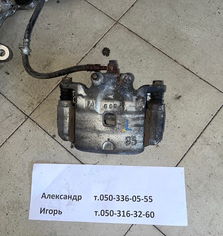 Суппорт тормозной передний правый 41001JN00A NISSAN