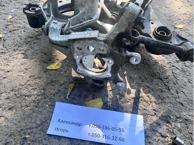Цапфа (поворотный кулак) задний левый 43019JN00A NISSAN