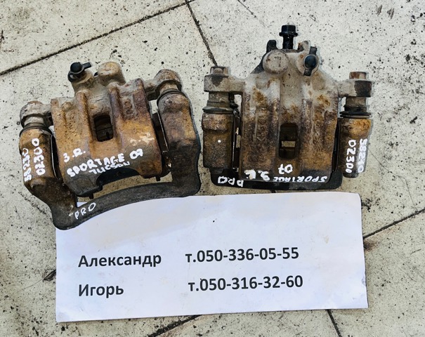 Суппорт тормозной левый задний 582100Z300 HYUNDAI
