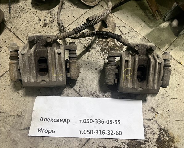 Суппорт тормозной левый задний 582102B700 HYUNDAI