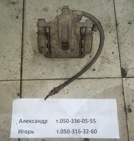Суппорт тормозной левый задний 582102E300 HYUNDAI