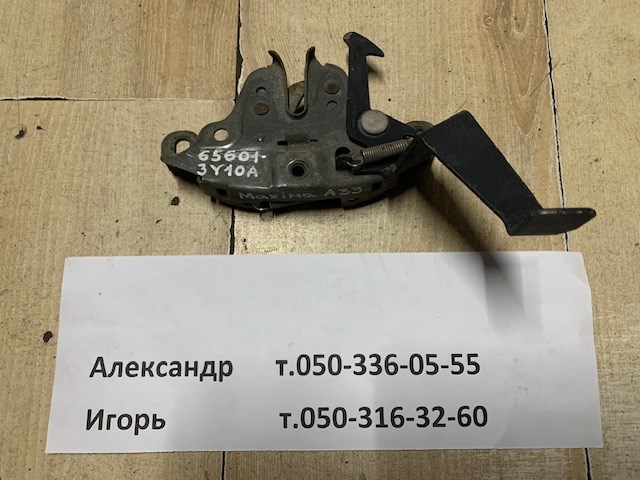 Замок крышки капота 656013Y10A NISSAN