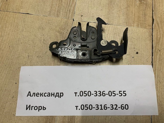 Запор капота (замок и привод замка капота) 65601AX000 NISSAN