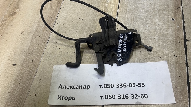 Запор капота (замок и привод замка капота) 811303K000 HYUNDAI
