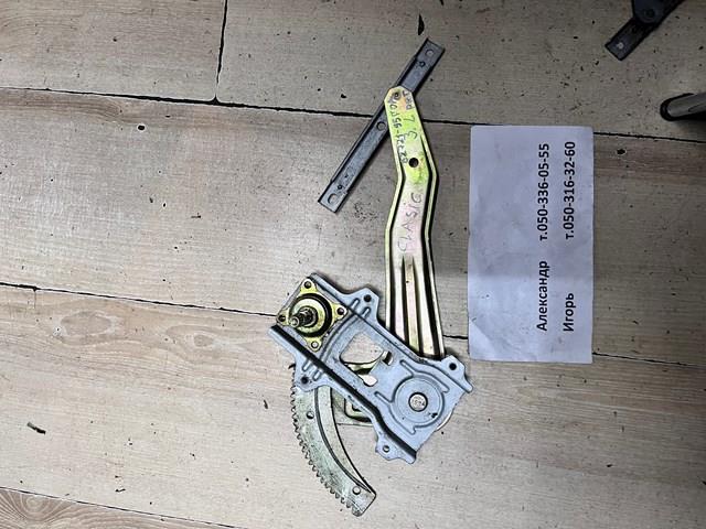 Стеклоподъемник левой задней двери 8272195F0A NISSAN