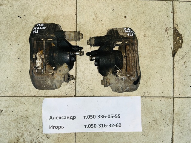 Суппорт тормозной, передний, правый D06133980C MAZDA