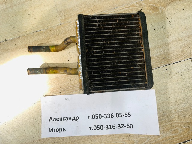 Радиатор печки D06161A10 MAZDA