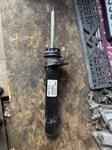 Стойка передняя левая 31316874459 BMW