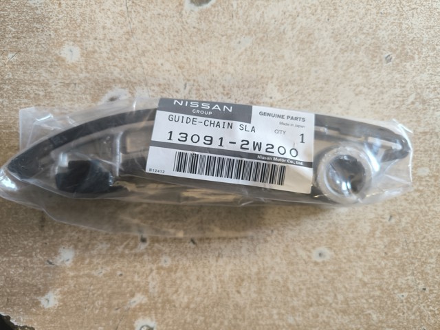Успокоитель цепи ГРМ, правый 130912W200 NISSAN