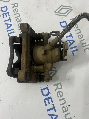 Суппорт тормозной левый задний 7711135704 RENAULT