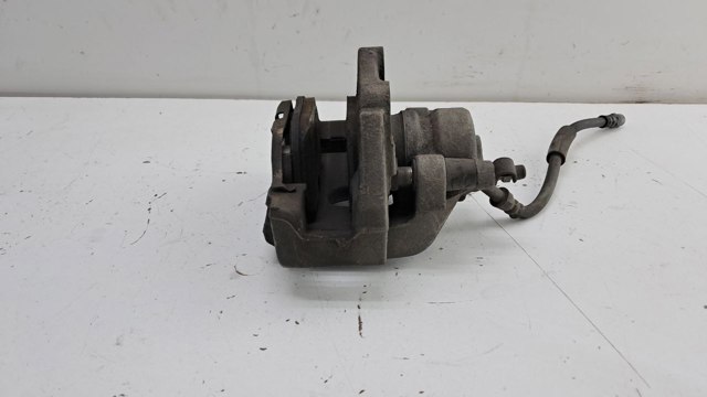 34216786831 BMW Суппорт задний левый купить в Житомир