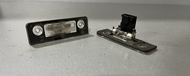 Фонарь подсветки заднего номера 1Z0943021 VAG