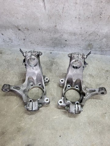 Цапфа - поворотный кулак передний, левый 400155NA0A NISSAN