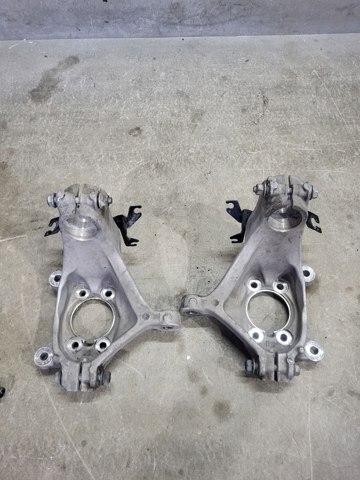 Цапфа поворотная левая 400156RA0A NISSAN