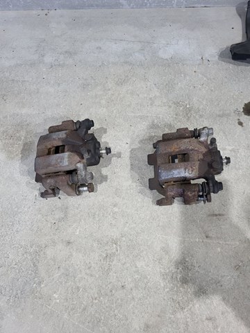 Суппорт тормозной задний правый 440011AA0A NISSAN