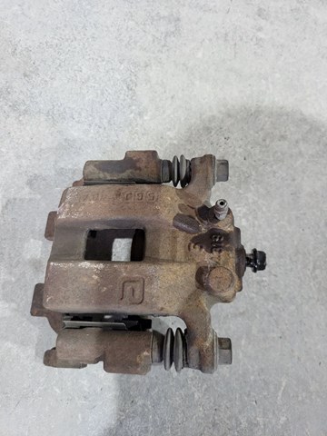 Тормозной суппорт задний левый 440111AA0A NISSAN