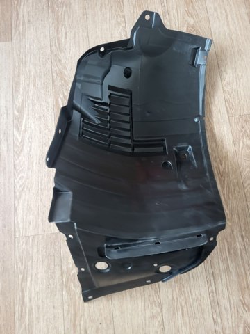 Передний правый подкрылок крыла переднего  638404GA0B NISSAN