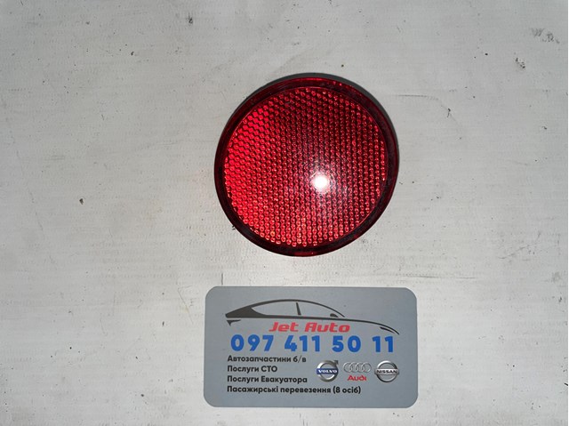 Левый катафот заднего бампера 26561BR00A NISSAN