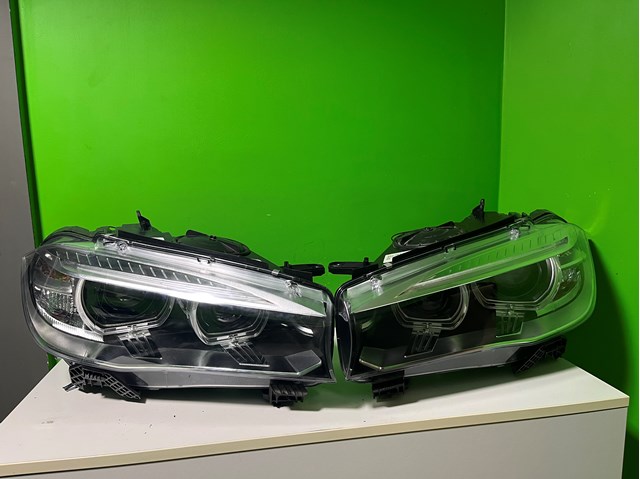 Вставка фары левой 63117317105 BMW