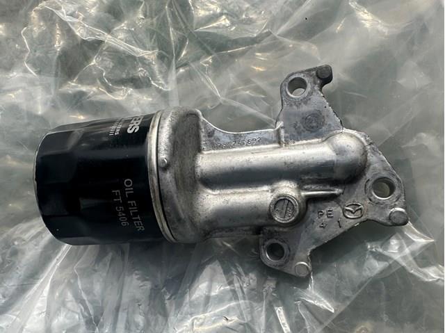 MAZDA PE0114311 Корпус масляного фильтра в наличии Хмельницкий