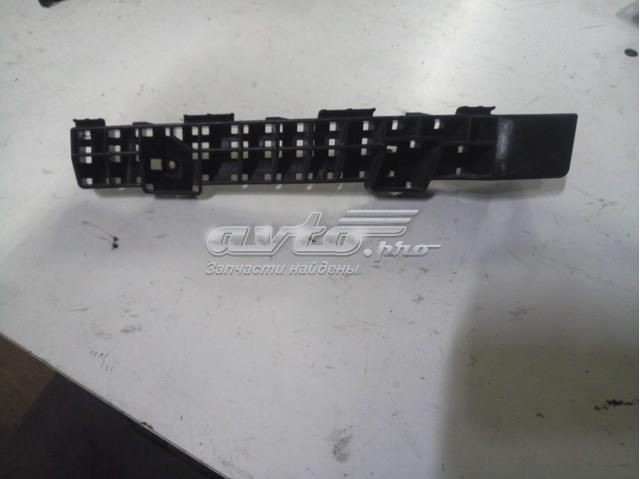 Левый кронштейн переднего бампера 57707SG030 SUBARU