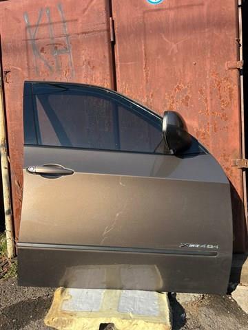 Пассажирская передняя дверь 41517211424 BMW