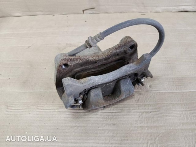 Суппорт тормозной передний левый 410113TA0A NISSAN
