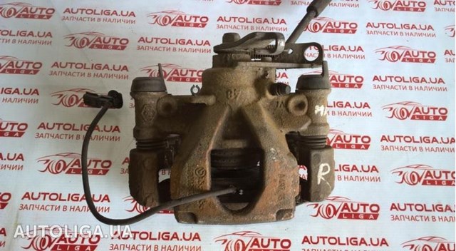 Тормозной суппорт правый задний 440013212R NISSAN