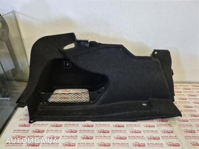 Облицовка багажного отсека, левая 51477289011 BMW