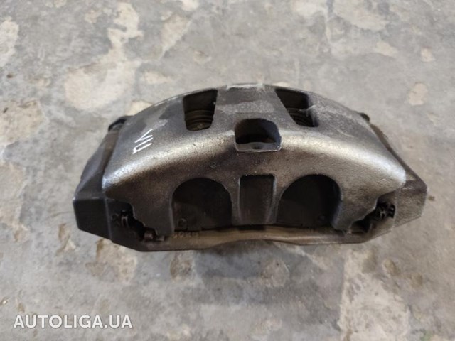 Суппорт тормозной, передний, левый 68144161AA CHRYSLER