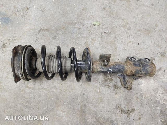 Амортизатор подвески передний левый E4302BJ00A NISSAN