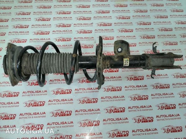 Амортизатор передний левый E43031KA1A NISSAN
