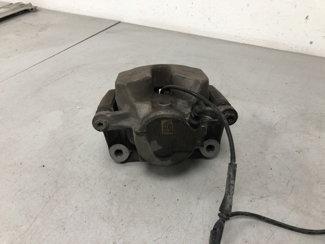 34106872799 BMW Суппорт тормозной передний левый купить в Житомир